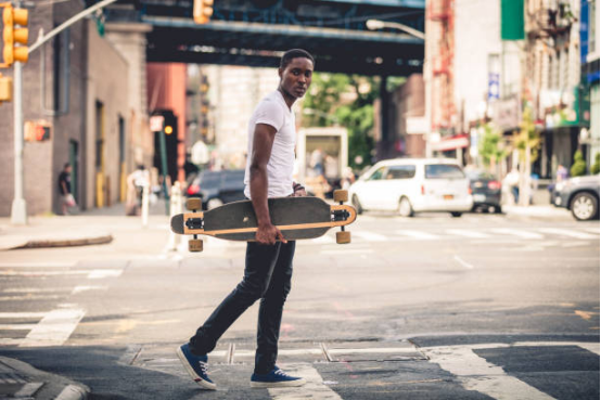 Rider exploring hidden city corners on a Longboard, discovering new places.