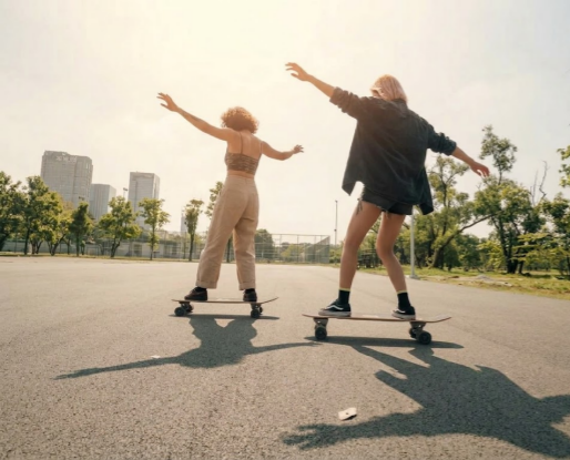 Skateboarder learning street tricks — ollie and kickflip require a trick deck, not a longboard